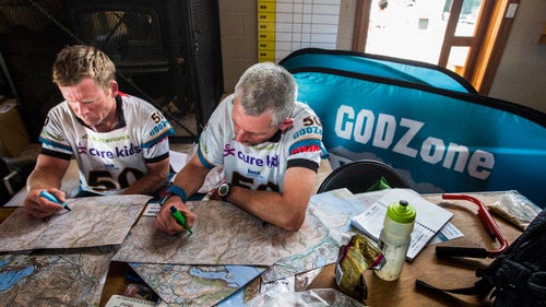 Headly Meacheam and Steve Lock from Team Kori Kita planning out the second half of their race route. Teams were given maps and checkpoints for the first half of the race just two hours before the event started, and had only 30 minutes to plan their routes before getting bussed to the starting line. Teams returned to the headquarters halfway through the race and could take all the time they wanted to plan the second half of their route.