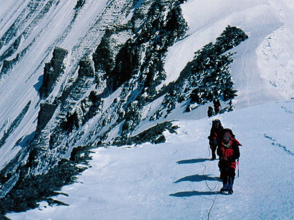 Expedition sleuths ascend the North Ridge on their way up to Camp V. May 1999.