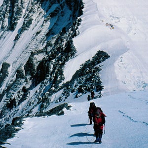 Expedition sleuths ascend the North Ridge on their way up to Camp V. May 1999.