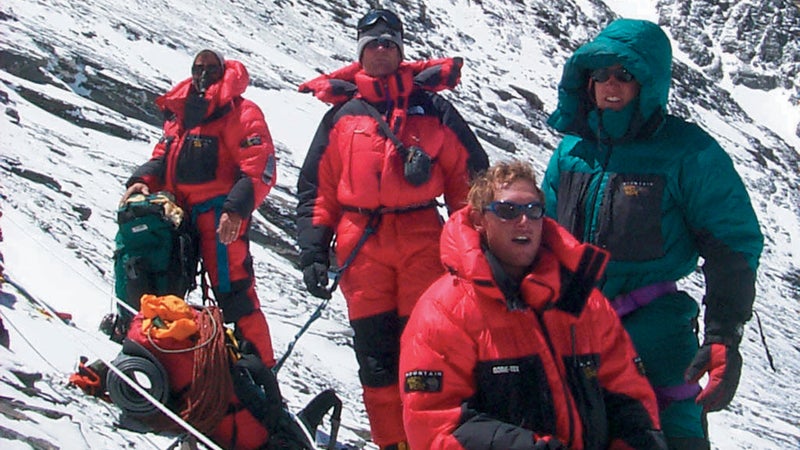 Climbers Politz, Anker, Richards, and Norton (above, from left to right) take five at 26,400 feet, the day before Anker's free climb.