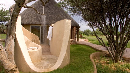 Okonjima's Grand African Villa features four private outdoor showers, so you can wash while looking out on its nature reserve.