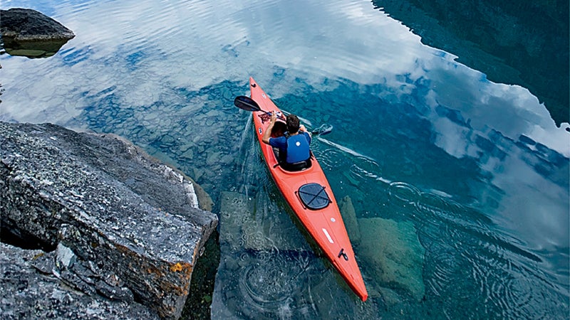Paddling the park's glassy waters.