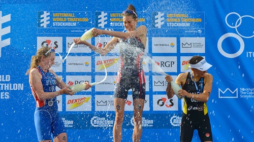 American Gwen Jorgensen (center) believes that the philosophy of “right coach, right time, right place” has guided her development as a triathlete.