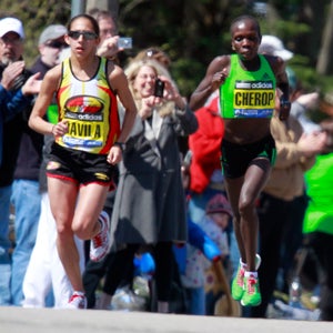Women elite runners, from left, Desiree Davila, of Rochester Hills, Mich., Sharon Cherop, of Kenya, Dire Tune, of Ethiopia, Alice Timbilili, of Kenya, and Caroline Kilel, of Kenya, compete on the course during the 115th running of the Boston Marathon, Monday, April 18, 2011, Newton, Mass. (AP Photo/Michael Dwyer)