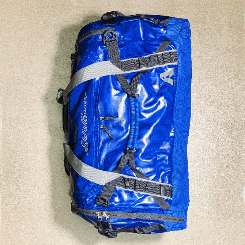 This is a serious expedition bag ($149) made from tough, waterproof, TPU­coated polyester. Testers appreciated the four padded grab handles, which made it easy to yank on and off roof racks, as well as the legit backpack straps. Bonus: when you’re home, this 90­liter duffel collapses to become its own storage pouch. eddiebauer.com