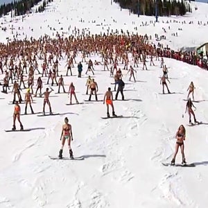 The almost 2,000 skiers and snowboarders set a record for largest downhill ride in swimsuits.