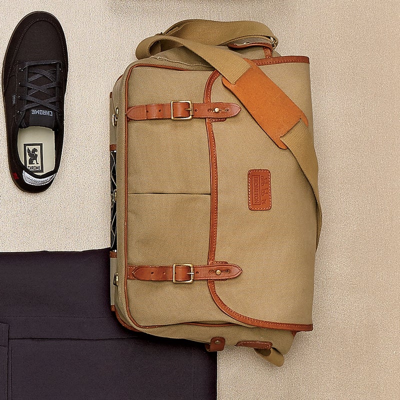 Designed by British luggage maker John Chapman, this rubber-lined canvas-and-leather briefcase ($400) reimagines the vintage game bag by incorporating a padded laptop sleeve and two zippered bellows pockets. brompton.com