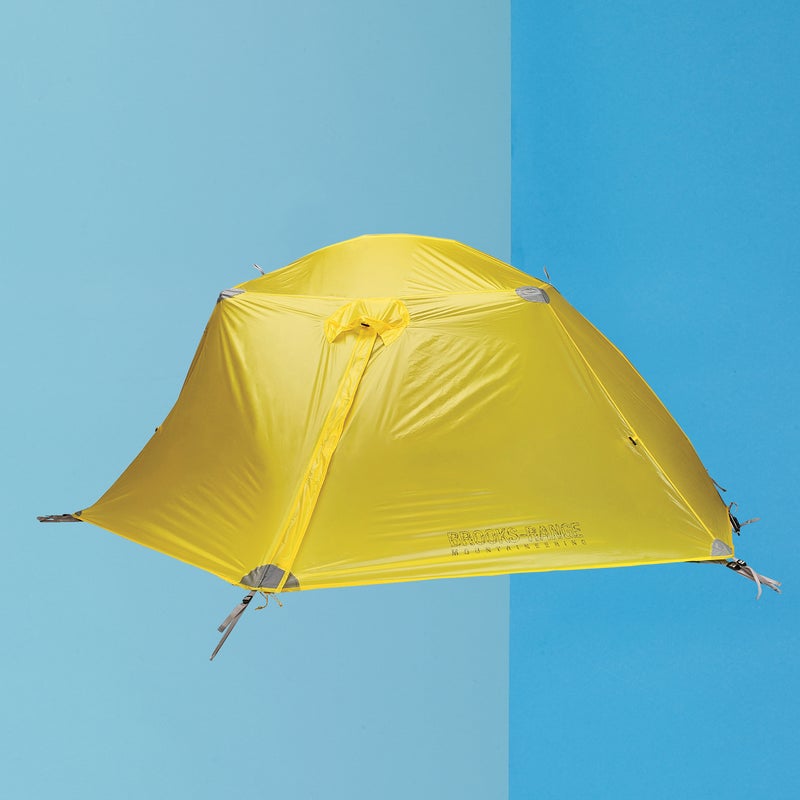 Best For: When weight is critical.
The Test: On first inspection, the freestanding, sub-three-pound Tension 30 ($420) seemed to sacrifice too much at the altar of ultralightness: it’s just big enough for two guys, with one vestibule and almost transparent fabrics. Yet in the field, it didn’t feel cramped or fragile. “It’s the small stuff that makes the difference,” said one tester. The single carbon center pole uses two aluminum cross poles and a cord-tension system to create lots of elbow room and sturdiness, and all the stress points are reinforced. The single vestibule is low-slung, but it’s larger than you’d think and easily stows two big packs, two pairs of boots, and more.
The Verdict: A few more guy-out points would be nice. As is, it’s impressively weatherproof and livable for an ultralight. 2.7 lbs; brooks-range.com
Livability: 3
Sturdiness: 4