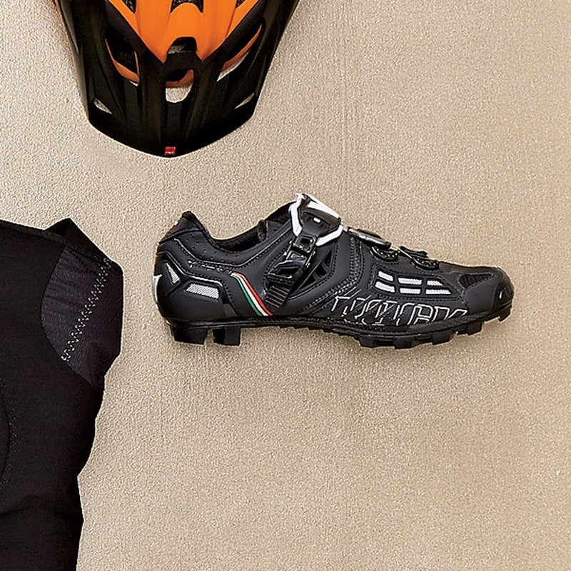 With a stiff carbon sole and combo ratchet-strap and spin-dial closure, this flashy, lightweight Italian shoe ($399) is built for on-the-bike speed, though sticky rubber on the bottom added enough grip when we had to run. vittoria-shoes.com