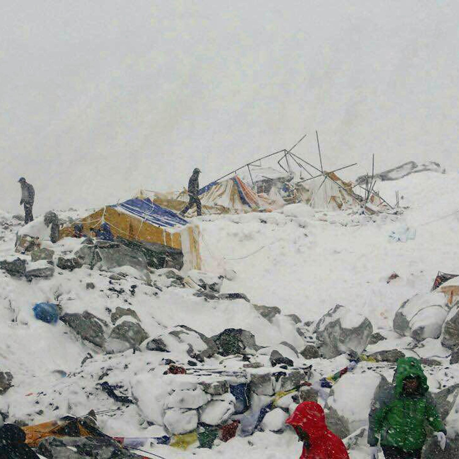 In this photo provided by Azim Afif people approach the scene after an avalanche triggered by a massive earthquake swept across Everest Base Camp, Nepal on Saturday, April 25, 2015. Afif and his team of four others from the Universiti Teknologi Malaysia (UTM) all survived the avalanche. (Azim Afif via AP)