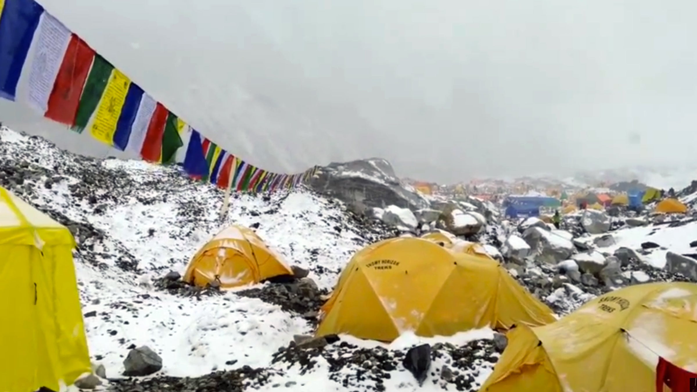 The first few seconds of the footage show Base Camp while climbers feel the ground shaking.