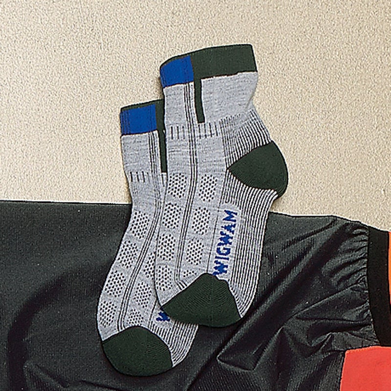 You can’t save much weight on socks, so go for comfort. The Rebel Fusion ($13) offers an inner liner of lofty olefin and an outer layer of nylon and merino. It wicks sweat and pads your feet for long miles. wigwam.com