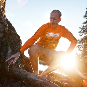 Anders Forselius scatters the ashes of Alex Blackburn on the beach near the Fort Grounds in Coeur d'Alene, Idaho.