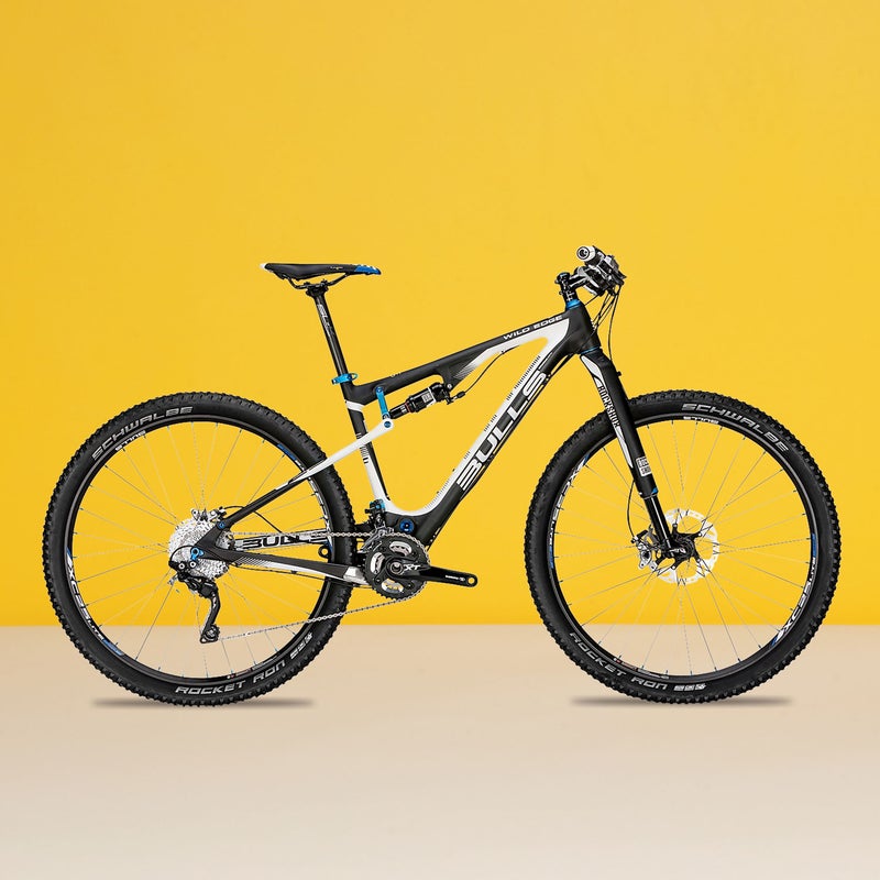 Best For: XC racers on a budget.The Test: Making its U.S. debut with this lightweight 29er ($3,799), the popular German brand surprised us with near telepathic handling and greyhound speed. “Stand on pedals, rocket forward,” said one tester. Just as you’d expect from a four-inch cross-country racer, it bumped around on rough trails. But the stiff RS-1 fork—controlled, along with the rear shock, from a single bar-mounted lever—did an impressive job of smoothing out minor chatter. With a full Shimano XT group set and carbon bits from FSA, the Wild Edge is a real bargain, especially since the fork alone sells for almost half the bike’s retail price. The Verdict: The best deal we’ve seen for a carbon racer. 25 lbs; bullsbikesusa.comClimbing: 4.5Descending: 3
