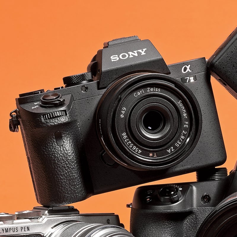 Best For: Channeling Ansel Adams.  The Test: With a ginormous 25-megapixel sensor—at 35.8 by 23.9 millimeters, it’s twice the size of the Nikon 1 V3’s—the a7 II ($1,700) is all about big, layered images. You can fire away in any light or even no light: at ultrahigh ISO, night shots didn’t get grainy. The meaty chassis is loaded with functions, and it’s the first mirrorless, full-frame-sensor camera with image stabilization, so any lens gets steadied at low shutter speeds.  The Verdict: No other camera on this side of $4,000 makes outdoor images as rich and detailed. sony.com  Utility: 3 Tech: 5