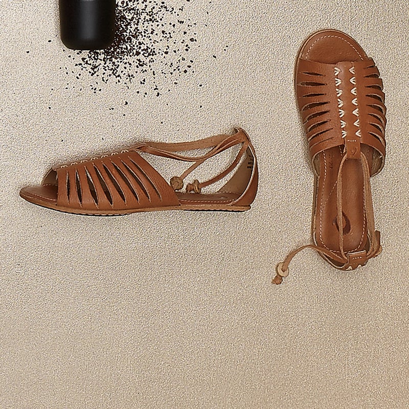 The Hikina ($150) is comfortable enough to wear all day, thanks to an anatomically molded outsole and a soft latex-foam footbed. And the hand-stitched detailing on the toe and heel, along with the caramel-colored leather, make it cute enough to pair with anything, even a bathing suit. olukai.com