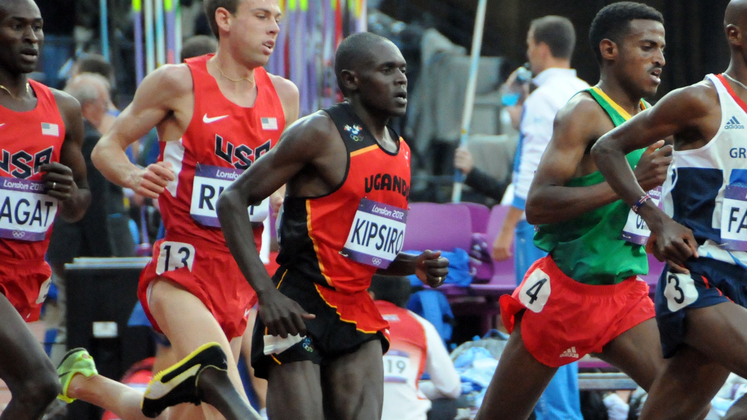 Moses Kipsiro (center) told the Daily Monitor that he suspects many Ugandan runners may have been infected with HIV, originating from a prominent coach.