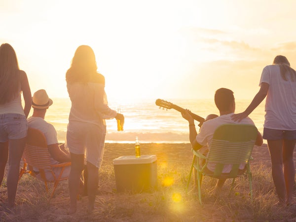 Anyone can grab a beer on a hot summer day. The men are seperated from the boys by the beer they choose.