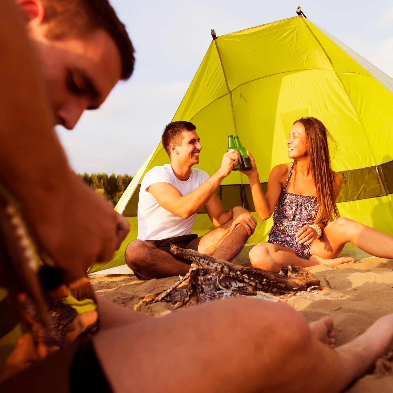 A cold beer and a warm fire on the beach.