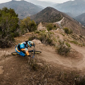 After climbing up the paved road's 37 switchbacks, Frenchman Fabian Barel makes quick work of the twisty corners of the Parvazo trial on his way back down the mountian.