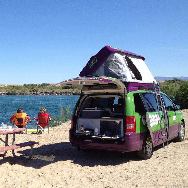 Exported from Australia to the United States in 2012, cheery green Jucy minivans sleep up to four. Pop the tent on top or sleep inside: The passenger seats morph into a bed. Vans also have a screw-in table, fridge, gas-burner stove, and sink in the trunk, plus a TV and DVD player that fold down from the ceiling. Pickup in San Francisco, Los Angeles, or Las Vegas. Rates start at $40 per night. jucyrentals.com 