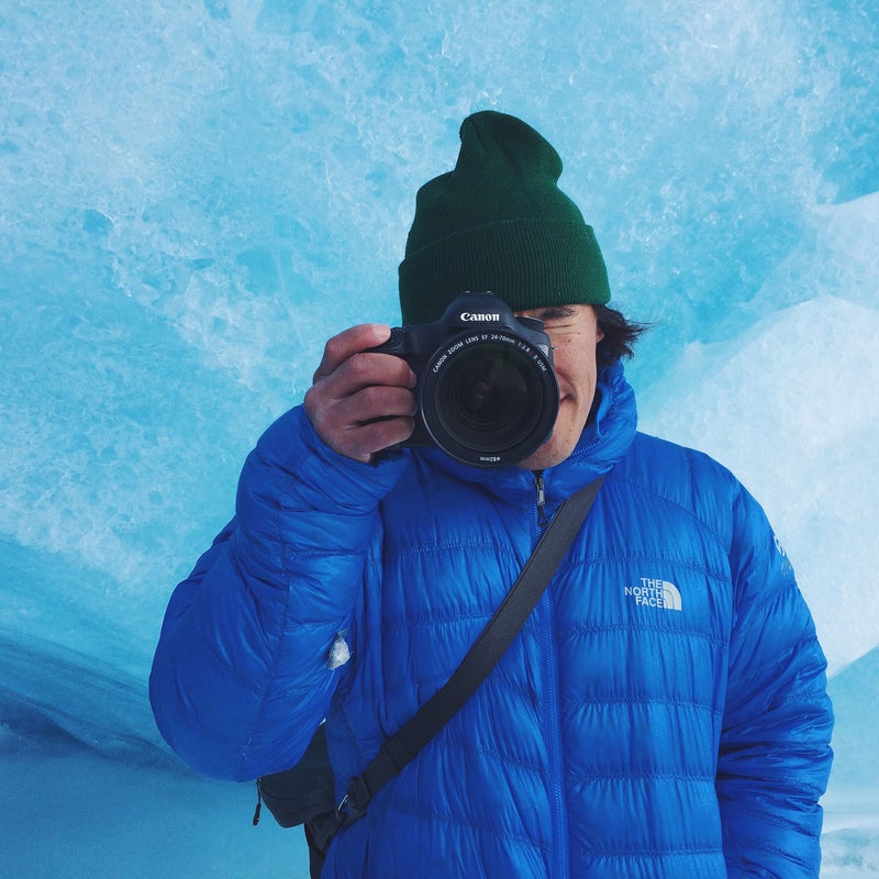Chin frames up another perfect square in a seasonal ice cave that forms on the Athabasca Glacier.