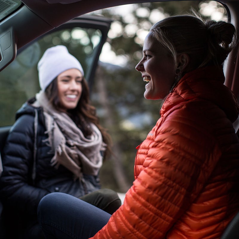 Alberta-native and pro-skier Tatum Monod making a gameplan with Thorien near Banff, Alberta.