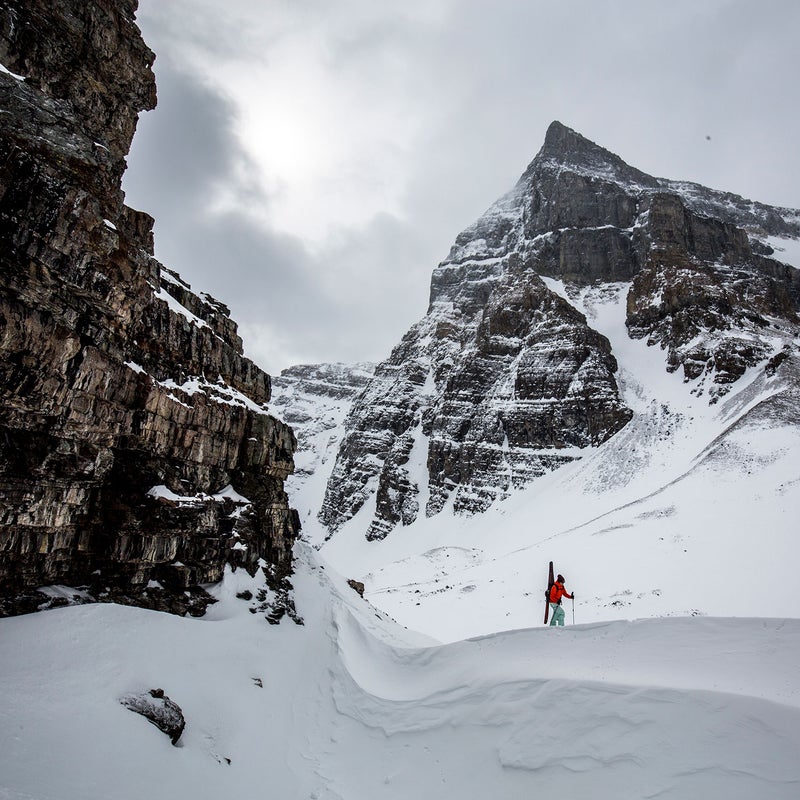 The dry winter also meant good snow stability. Here, Thorien makes her way up the backside of Surprise Pass, out of Lake Louise. The couloirs on the other side descend right to the lake.
