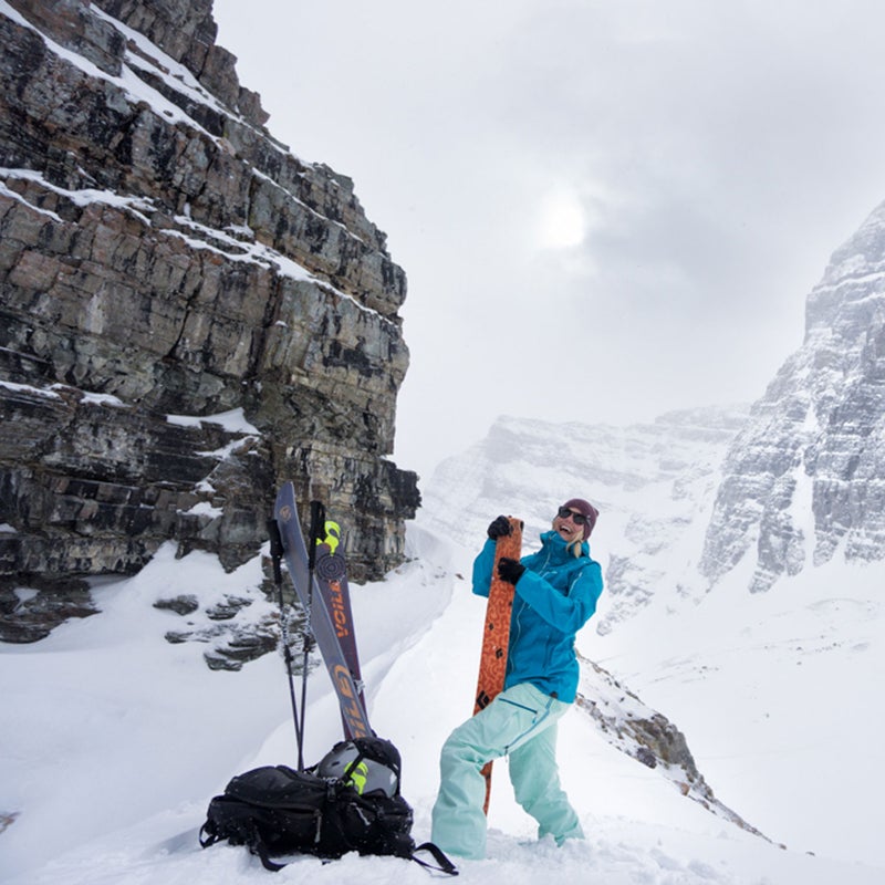 Thorien peeling her climbing skins near the summit of Surprise Pass鈥攁nd having just a little bit of fun in the process.
