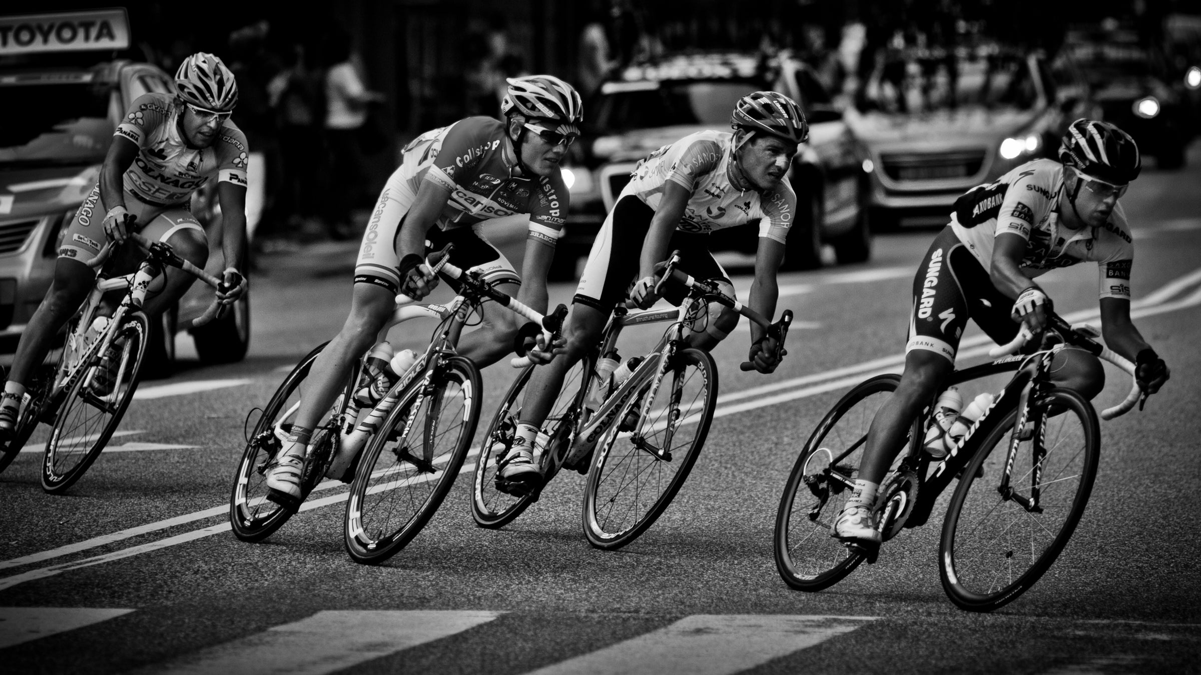 Richie Porte (front) got a flat tire toward the end of the Giro's Stage 10 and was offered a spare from a fellow cyclist on an opposing team.