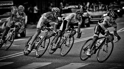 Richie Porte (front) got a flat tire toward the end of the Giro's Stage 10 and was offered a spare from a fellow cyclist on an opposing team.