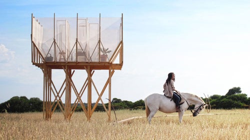 The elevated sanctuary located on the Balearic Islands in Spain allows users time to themselves without feeling disconnected from nature. Set in the center of a barley field, the translucent structure allows those inside a panoramic view of the Mediterranean Sea.