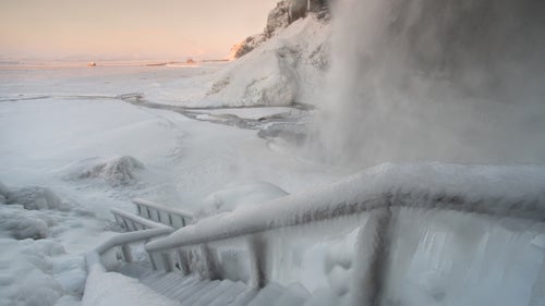There鈥檚 no shortage of natural creativity in Iceland. To make this photo, I strapped on my crampons and braved the stairs. Spray from the waterfall not only helped me capture a scene right out of Frozen but also coated me with ice. The key to success? I kept moving, using my wipe cloth repeatedly on the Moment 18mm wide-angle lens. Pictured: Seljalandsfoss Waterfall.