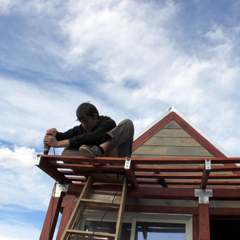 Some, like Smith, love tiny house porches. Others prefer to maximize the interior space. The porch Smith built is so big (relatively speaking) that it actually hangs off the back of the trailer.