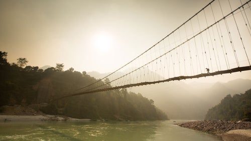 I got a quarter of the way across this bridge when I noticed a man below waving his hands, gesturing for me to come down. The bridge looked old and shaky, but I thought it looked sturdy enough to hold for at least one pass. Once I got down, a local boy crossed the bridge and nobody made a fuss.