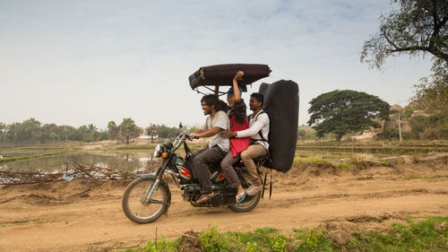 Our chosen mode of transportation on the dirt roads of Hampi. I considered it part of our warm-up: core, arms, and thighs! Dodging the road ruts while on the verge of falling over from laughing was half the fun.