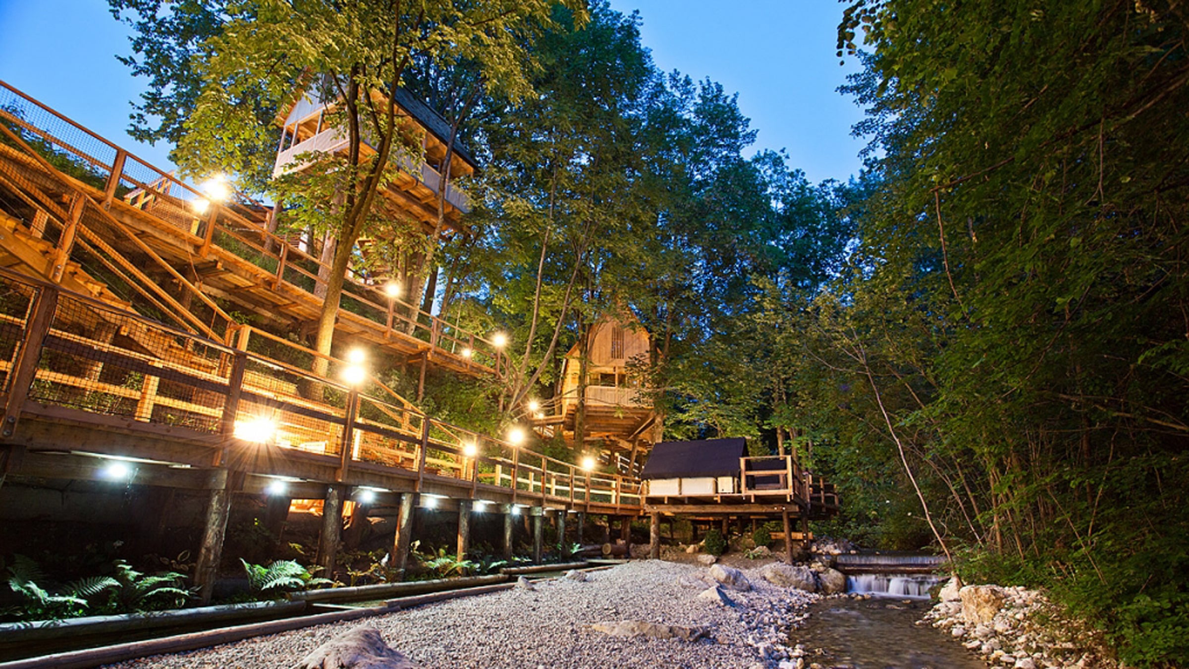 Garden Village Bled in Slovenia features six treehouses connected by suspension bridges.