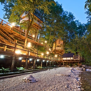 Garden Village Bled in Slovenia features six treehouses connected by suspension bridges.