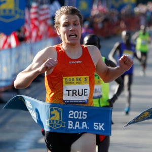 Ben True wins the men's division in the Boston Marathon 5k in Boston, Saturday, April 18, 2015. The 119th Boston Marathon will be run on Monday. (AP Photo/Michael Dwyer)