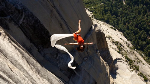Artistic director Amelia Rudolph leaps into midair, trailing a ribbon of white silk. For Rudolph, Bandaloop鈥檚 Yosemite performance, dubbed 鈥淐rossing鈥 and largely funded by the National Endowment for the Arts, is an opportunity to explore the idea of dance staged as a journey.