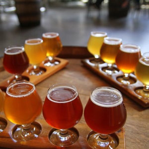 With beer distribution power concentrated in the hands of big beer companies, some smaller brewers have gotten creative to get their beer to the public.