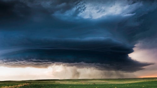 By this summer, Long Island, New York, photographer Eric Meola will have logged more than 100 days and perhaps as many as 25,000 miles in the Great Plains over the past three years. It’s all for his latest book project, a personal work-in-progress titled Tornado Alley: The Sky Above the Land Below, and an upcoming gallery exhibition in New York City, in which he trains his lens on the types of storms that have ravaged the heartland of the U.S. in recent years.  “Photographing the constantly changing shapes and movement of the atmosphere is, for me, an exploration of the ephemeral,” says Meola, who travels with Tempest Tours. “My images are meant to capture the dichotomy between the fury of skies torn apart and the tranquil, lonely solitude of the Great Plains. Storms have a surreal grandeur—they’re alive, they’re filled with light, they move, they change shape in front of you. Storm chasing pulls you in and it won't let go.”  Photo: Supercell in North Platte, Nebraska 2014 A classic large supercell showing inflow bands (carrying moisture into the storm formation) on the right and the precipitation core.