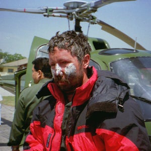 Seaborne Beck Weathers of Dallas, Texas, an American survivor of the Swedish Expedition, is flown to Katmandu Monday, May 13, 1996 by a rescue helicopter from Mt. Everest. Eight climbers still remained missing in unsurvivable conditions on the 29,028-foot (8,848 meters) mountain.  Weathers suffered from facial burns from high winds and severe frostbite on both hands. (AP Photo/Binod Joshi)