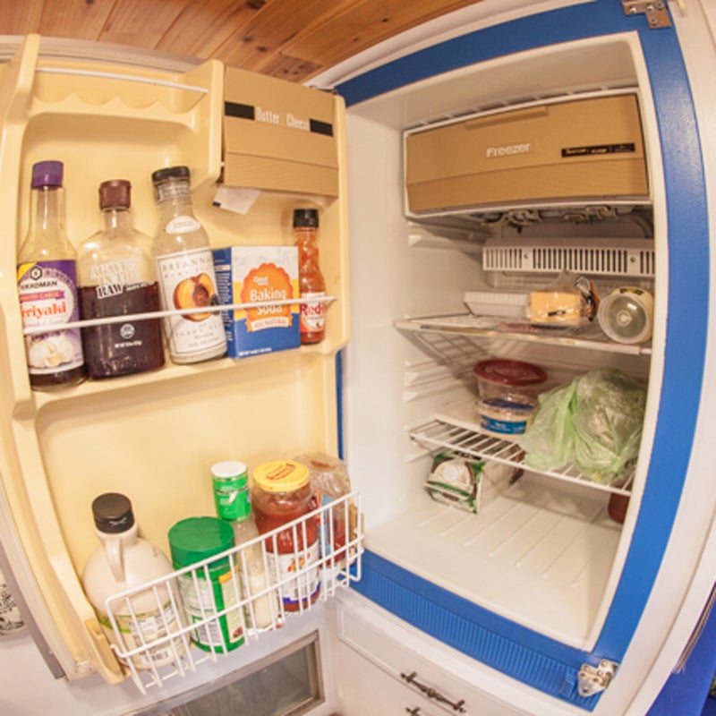 The fridge runs primarily on propane rather than electricity. The only thing to remember: Park on a level surface or else it won’t run smoothly.