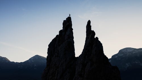 Highlining originated in Yosemite. As such, it鈥檚 inextricably linked to climbing. The summit of these rabbit-ear spires in Potrero Chico is only achieved through tricky, technical rock climbing. After 175 feet of face climbing, I scrambled past the anchors and took in the sunrise from the left summit.