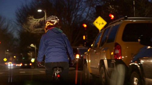 Lights on the back of the Lumos helmet alert drivers when a rider brakes or is about to turn.