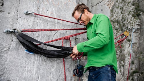 Highline anchors can be rigged in many different ways, but Hudnut prefers the method he learned from his mentor, Terry Acomb, who has been developing highline systems since the late 鈥90s. Hudnut drills multiple 5.5-inch x 0.5-inch bolts into the hard limestone and equalizes the system with a sliding 鈥淴鈥 of static 11-millimeter cordelette.
