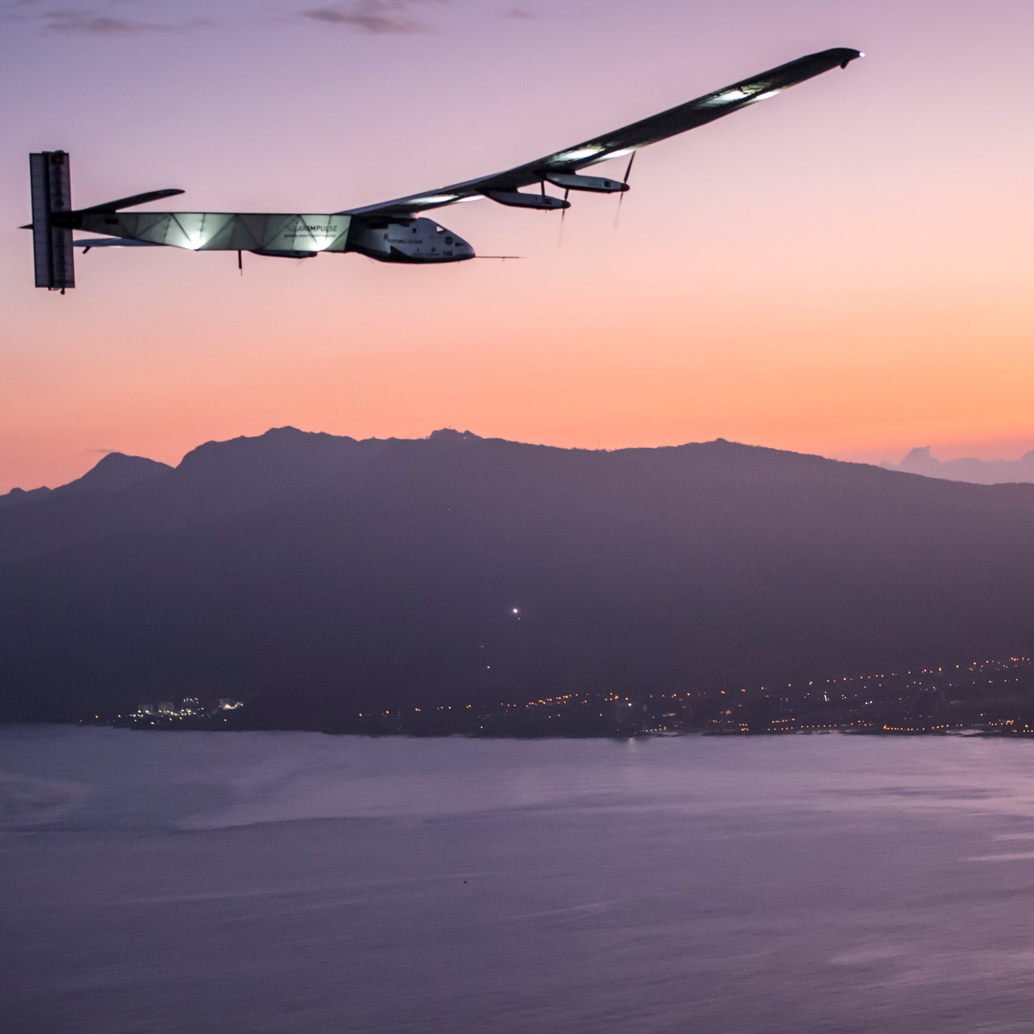 Hawaii, United States of America, June 28, 2015: Solar Impusle 2 lands in Hawaii  with AndrÈ Borschberg at the controls. The First Round-the-World Solar Flight will take 500 flight hours and cover 35í000 km, over five months. Swiss founders and pilots, Bertrand Piccard and AndrÈ Borschberg hope to demonstrate how pioneering spirit, innovation and clean technologies can change the world. The duo will take turns flying Solar Impulse 2, changing at each stop and will fly over the Arabian Sea, to India, to Myanmar, to China, across the Pacific Ocean, to the United States, over the Atlantic Ocean to Southern Europe or Northern Africa before finishing the journey by returning to the initial departure point. Landings will be made every few days to switch pilots and organize public events for governments, schools and universities.