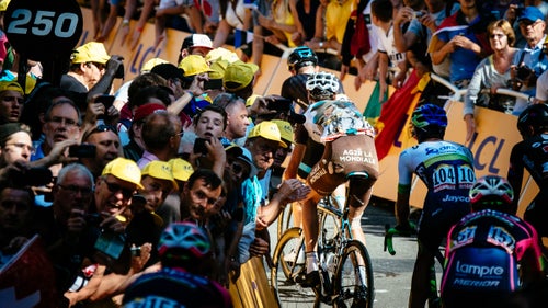 Former Paris-Roubaix winner Johan Vansummeren carried the signs of the Tour's many opening-week crashes up the brutally steep Mur de Huy finish in southeast Belgium during stage 3.