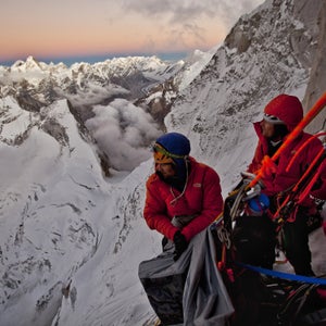 Day 5. Conrad and Renan take a break from
building the portaledge camp at 19,000ft during sunset to look over
the Gangotri Glacier and Shivling.